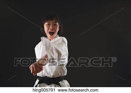 Japanese kid in karate uniform on black background View Large Photo Image Stock Image - Japanese kid in karate uniform on black background. Fotosearch