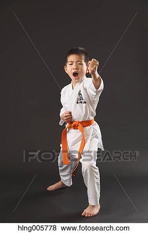 Japanese kid in karate uniform on black background View Large Photo Image Stock Photo - Japanese kid in karate uniform on black background. Fotosearch