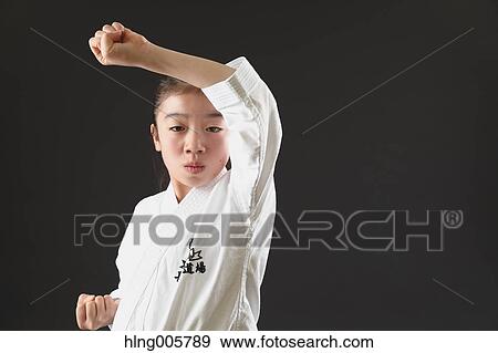 Japanese kid in karate uniform on black background View Large Photo Image Stock Photo - Japanese kid in karate uniform on black background. Fotosearch