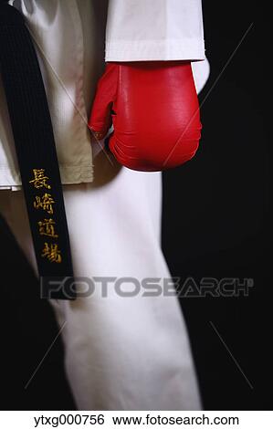 Japanese kid in karate uniform on black background View Large Photo Image Stock Photograph - Japanese kid in karate uniform on black background. Fotosearch