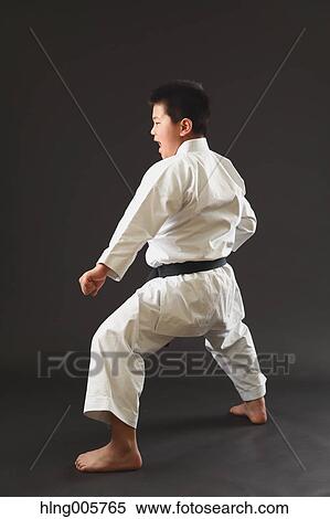Japanese kid in karate uniform on black background View Large Photo Image Stock Photography - Japanese kid in karate uniform on black background. Fotosearch