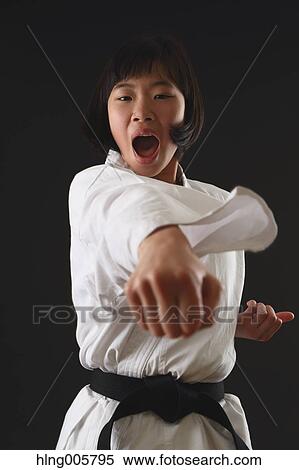Japanese kid in karate uniform on black background View Large Photo Image Stock Photography - Japanese kid in karate uniform on black background. Fotosearch