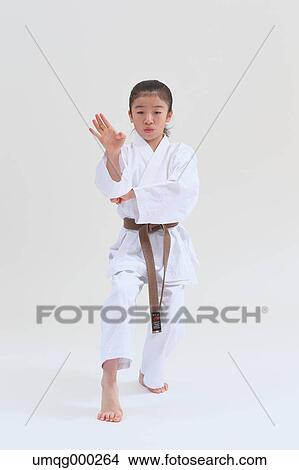 Japanese kid in karate uniform on white background View Large Photo Image Picture - Japanese kid in karate uniform on white background. Fotosearch