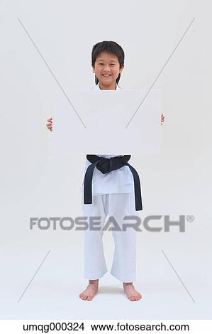 Japanese kid in karate uniform on white background View Large Photo Image Picture - Japanese kid in karate uniform on white background. Fotosearch