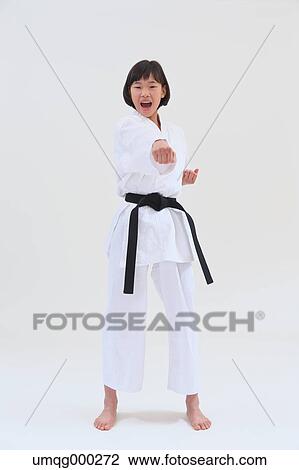 Japanese kid in karate uniform on white background View Large Photo Image Stock Image - Japanese kid in karate uniform on white background. Fotosearch