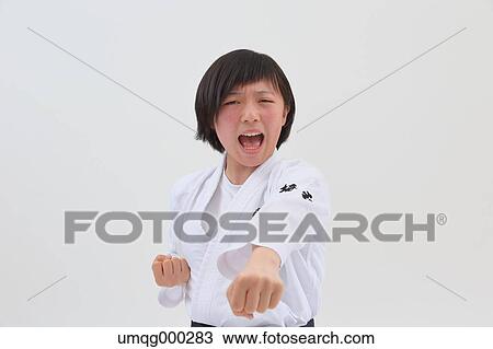 Japanese kid in karate uniform on white background View Large Photo Image Stock Image - Japanese kid in karate uniform on white background. Fotosearch
