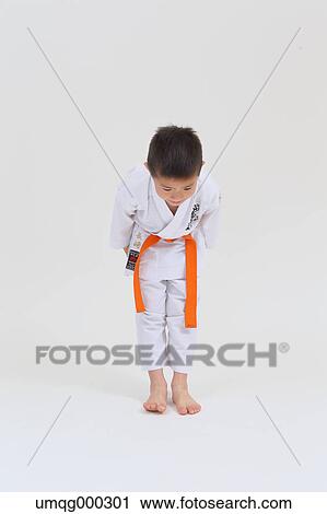 Japanese kid in karate uniform on white background View Large Photo Image Stock Image - Japanese kid in karate uniform on white background. Fotosearch