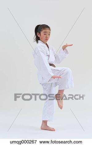 Japanese kid in karate uniform on white background View Large Photo Image Stock Photo - Japanese kid in karate uniform on white background. Fotosearch