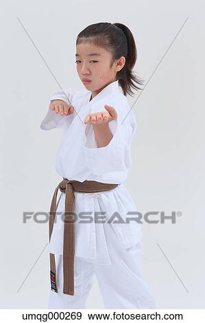 Japanese kid in karate uniform on white background View Large Photo Image Stock Photo - Japanese kid in karate uniform on white background. Fotosearch