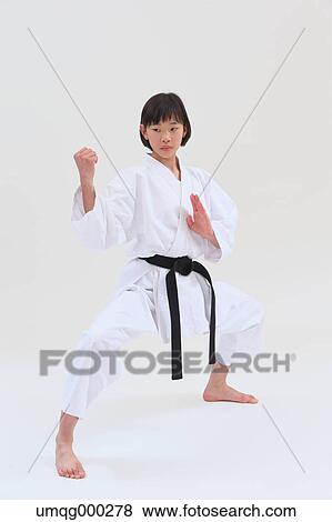 Japanese kid in karate uniform on white background View Large Photo Image Stock Photo - Japanese kid in karate uniform on white background. Fotosearch