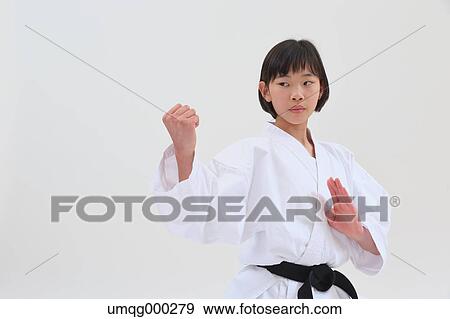 Japanese kid in karate uniform on white background View Large Photo Image Stock Photo - Japanese kid in karate uniform on white background. Fotosearch