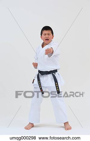 Japanese kid in karate uniform on white background View Large Photo Image Stock Photo - Japanese kid in karate uniform on white background. Fotosearch