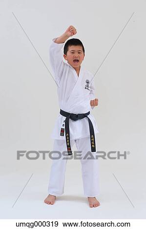 Japanese kid in karate uniform on white background View Large Photo Image Stock Photo - Japanese kid in karate uniform on white background. Fotosearch