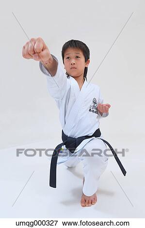 Japanese kid in karate uniform on white background View Large Photo Image Stock Photo - Japanese kid in karate uniform on white background. Fotosearch