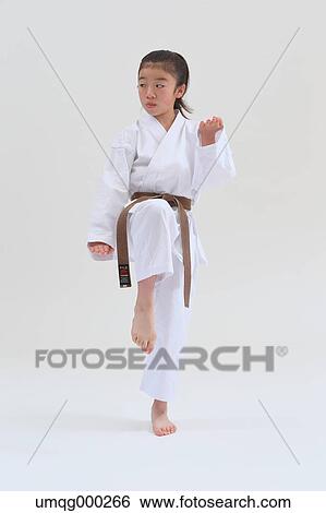 Japanese kid in karate uniform on white background View Large Photo Image Stock Photograph - Japanese kid in karate uniform on white background. Fotosearch