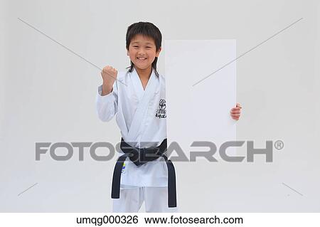 Japanese kid in karate uniform on white background View Large Photo Image Stock Photograph - Japanese kid in karate uniform on white background. Fotosearch