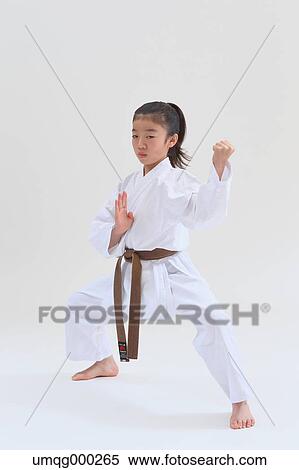 Japanese kid in karate uniform on white background View Large Photo Image Stock Photography - Japanese kid in karate uniform on white background. Fotosearch