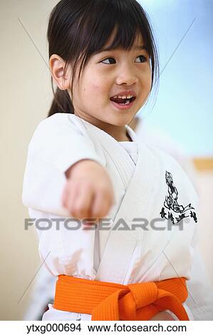 Japanese kid in karate uniform training View Large Photo Image Picture - Japanese kid in karate uniform training. Fotosearch