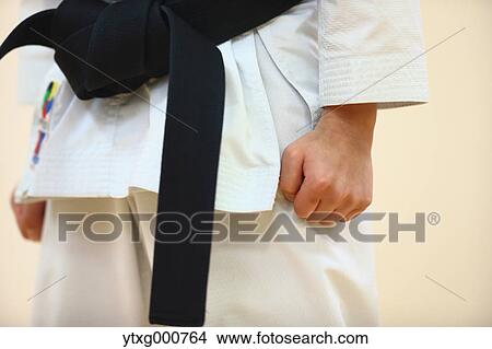 Japanese kid in karate uniform training View Large Photo Image Picture - Japanese kid in karate uniform training. Fotosearch