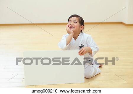 Japanese kid in karate uniform training View Large Photo Image Stock Image - Japanese kid in karate uniform training. Fotosearch