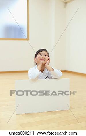 Japanese kid in karate uniform training View Large Photo Image Stock Image - Japanese kid in karate uniform training. Fotosearch