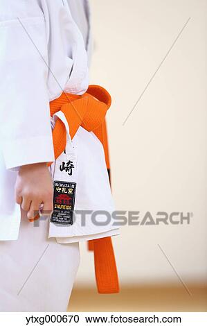 Japanese kid in karate uniform training View Large Photo Image Stock Image - Japanese kid in karate uniform training. Fotosearch