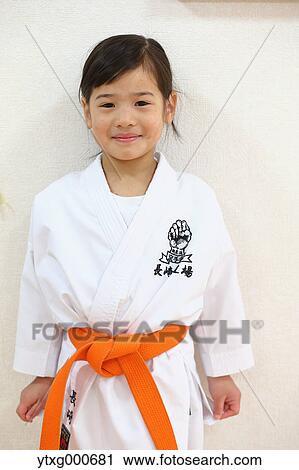 Japanese kid in karate uniform training View Large Photo Image Stock Image - Japanese kid in karate uniform training. Fotosearch