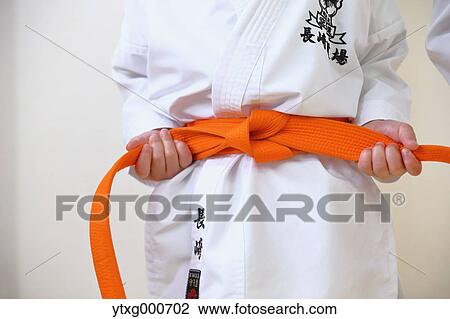 Japanese kid in karate uniform training View Large Photo Image Stock Image - Japanese kid in karate uniform training. Fotosearch