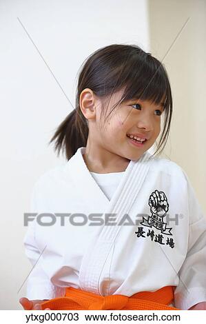 Japanese kid in karate uniform training View Large Photo Image Stock Image - Japanese kid in karate uniform training. Fotosearch