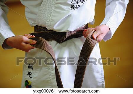 Japanese kid in karate uniform training View Large Photo Image Stock Image - Japanese kid in karate uniform training. Fotosearch