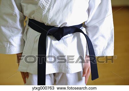 Japanese kid in karate uniform training View Large Photo Image Stock Image - Japanese kid in karate uniform training. Fotosearch