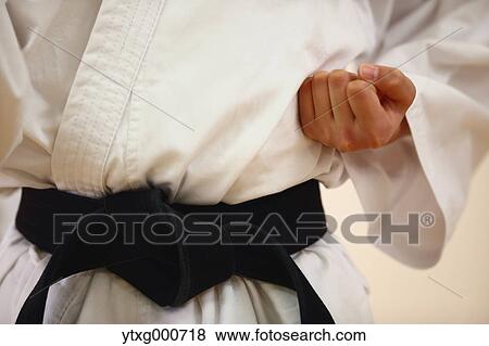 Japanese kid in karate uniform training View Large Photo Image Stock Photo - Japanese kid in karate uniform training. Fotosearch