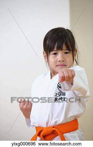 Japanese kid in karate uniform training View Large Photo Image Stock Photograph - Japanese kid in karate uniform training. Fotosearch