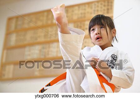 Japanese kid in karate uniform training View Large Photo Image Stock Photograph - Japanese kid in karate uniform training. Fotosearch