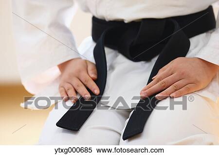 Japanese kid in karate uniform training View Large Photo Image Stock Photography - Japanese kid in karate uniform training. Fotosearch
