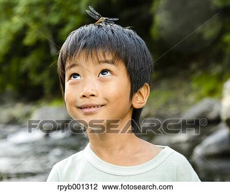 Japanese kid playing at the river View Large Photo Image Stock Image - Japanese kid playing at the river. Fotosearch