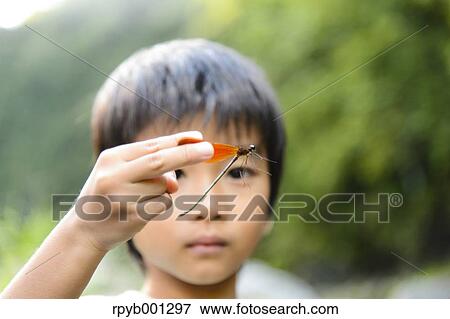 Japanese kid playing at the river View Large Photo Image Stock Photo - Japanese kid playing at the river. Fotosearch