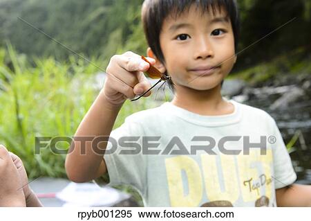 Japanese kid playing at the river View Large Photo Image Stock Photography - Japanese kid playing at the river. Fotosearch