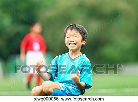 Japanese kid playing soccer View Large Photo Image Stock Photograph - Japanese kid playing soccer. Fotosearch