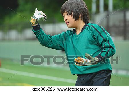 Japanese kid playing soccer View Large Photo Image Stock Photography - Japanese kid playing soccer. Fotosearch