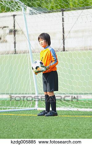 Japanese kid playing soccer View Large Photo Image Stock Photography - Japanese kid playing soccer. Fotosearch