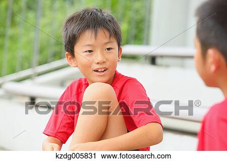 Stock Image - Japanese kids at soccer field. Fotosearch