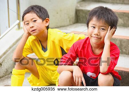 Stock Photography - Japanese kids at soccer field. Fotosearch