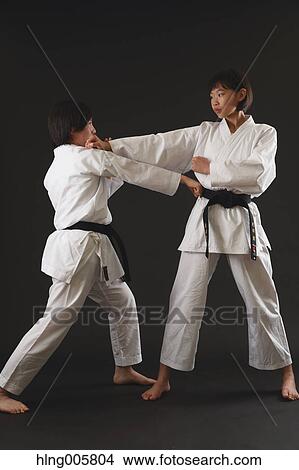 Japanese kids in karate uniform on black background View Large Photo Image Picture - Japanese kids in karate uniform on black background. Fotosearch