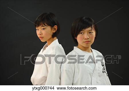 Japanese kids in karate uniform on black background View Large Photo Image Picture - Japanese kids in karate uniform on black background. Fotosearch