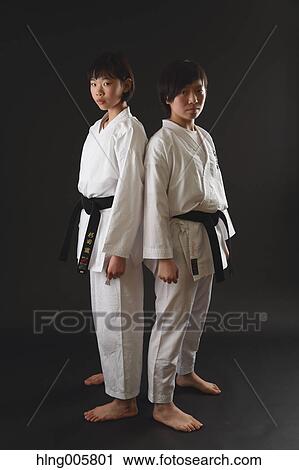 Japanese kids in karate uniform on black background View Large Photo Image Stock Image - Japanese kids in karate uniform on black background. Fotosearch