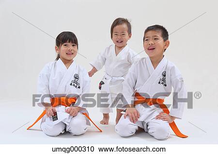 Japanese kids in karate uniform on white background View Large Photo Image Stock Image - Japanese kids in karate uniform on white background. Fotosearch