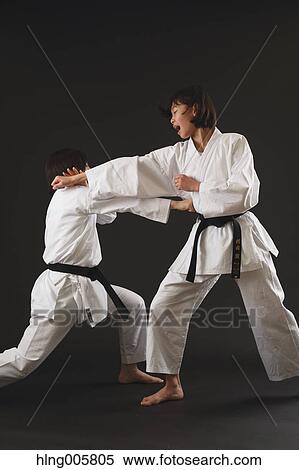 Japanese kids in karate uniform on black background View Large Photo Image Stock Photography - Japanese kids in karate uniform on black background. Fotosearch