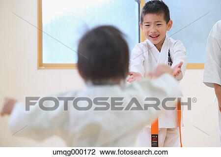 Stock Image - Japanese kids karate class. Fotosearch