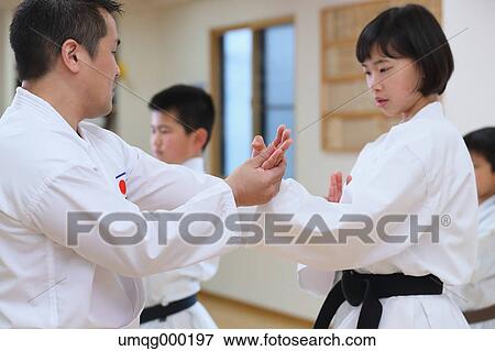Stock Photo - Japanese kids karate class. Fotosearch
